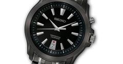 Seiko Men's SNQ121 Two Tone Stainless Steel Analog Black Dial Watch